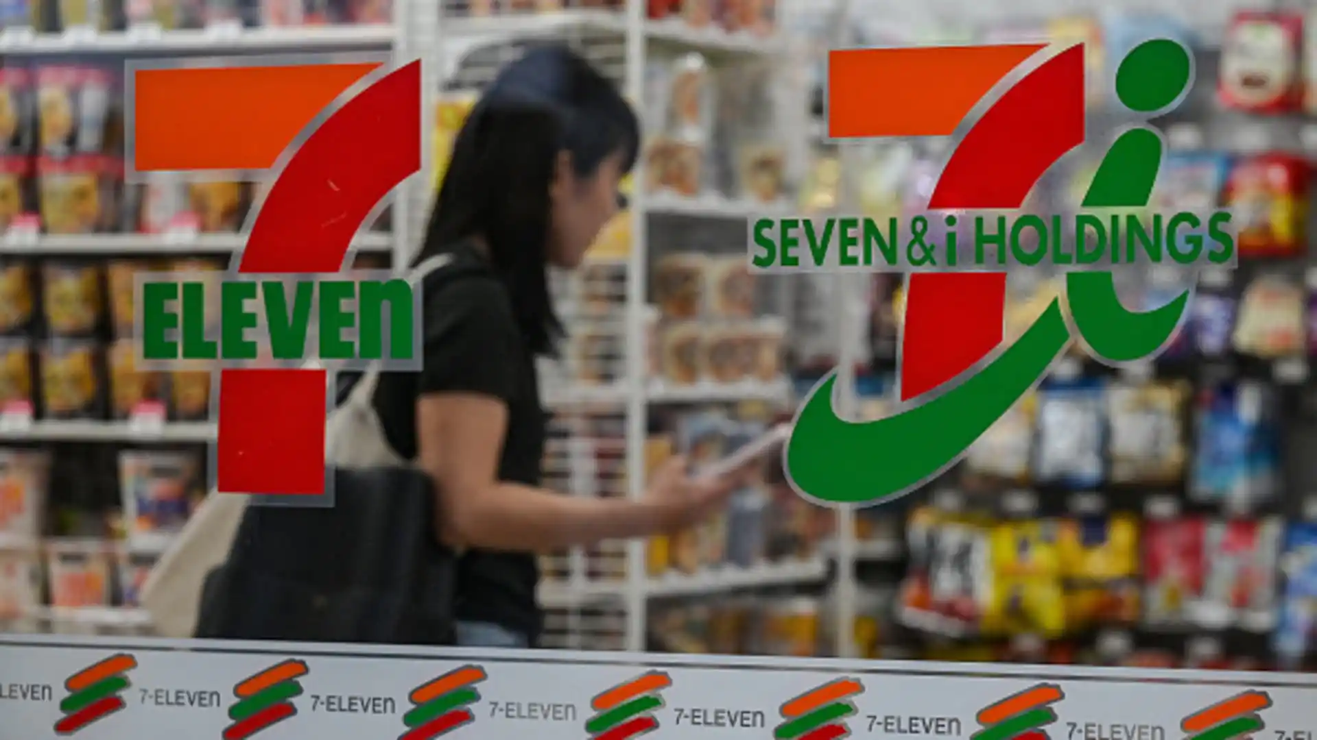 7-Eleven parent company cuts full-year profit forecast